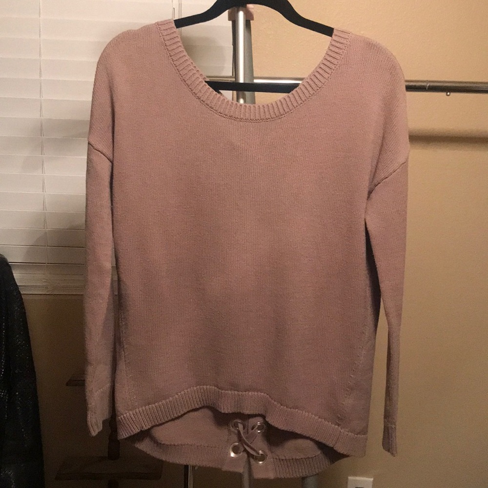 Express sweater with grommet lace up detailing!